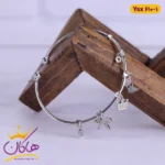 دستبند النگویی استیل زنانه آویز تاج و پاپیون | کد ysx610/1