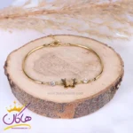 دستبند استیل زنانه پروانه ای نگینی طلایی | st 4106