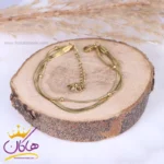 دستبند استیل زنانه دو لاین هرینگبون طلایی | st 4300