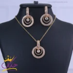 نیم ست استیل زنانه طلایی طرح حلقه ای نگین دار | XP 46395