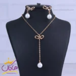 نیم ست استیل زنانه طلایی طرح پاپیون و مروارید | XP 46402