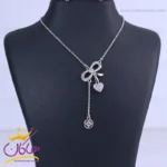گردنبند استیل زنانه پاپیون و قلب نگین‌ دار | XP 13386