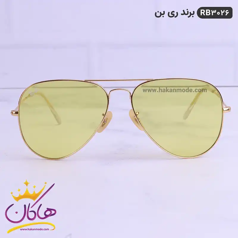 ray-ban-sunglasses-code-RB-3026.51.webp عینک ری بن طلایی زرد اورجینال 3026 - Image 1